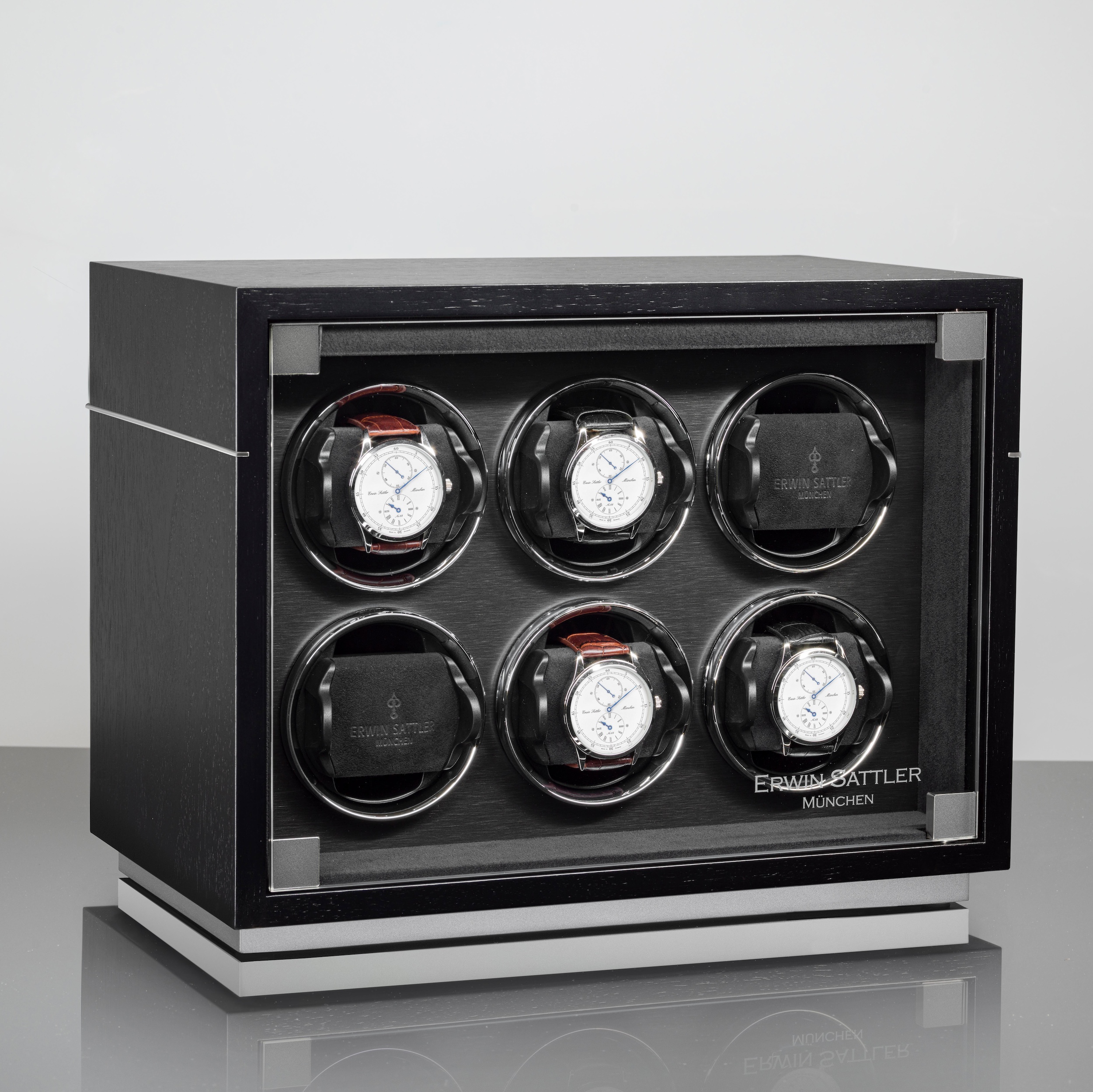 Uhrenbeweger Rotalis 6 von Erwin Sattler mit sechs Uhren, in einem eleganten schwarzen Gehäuse.
